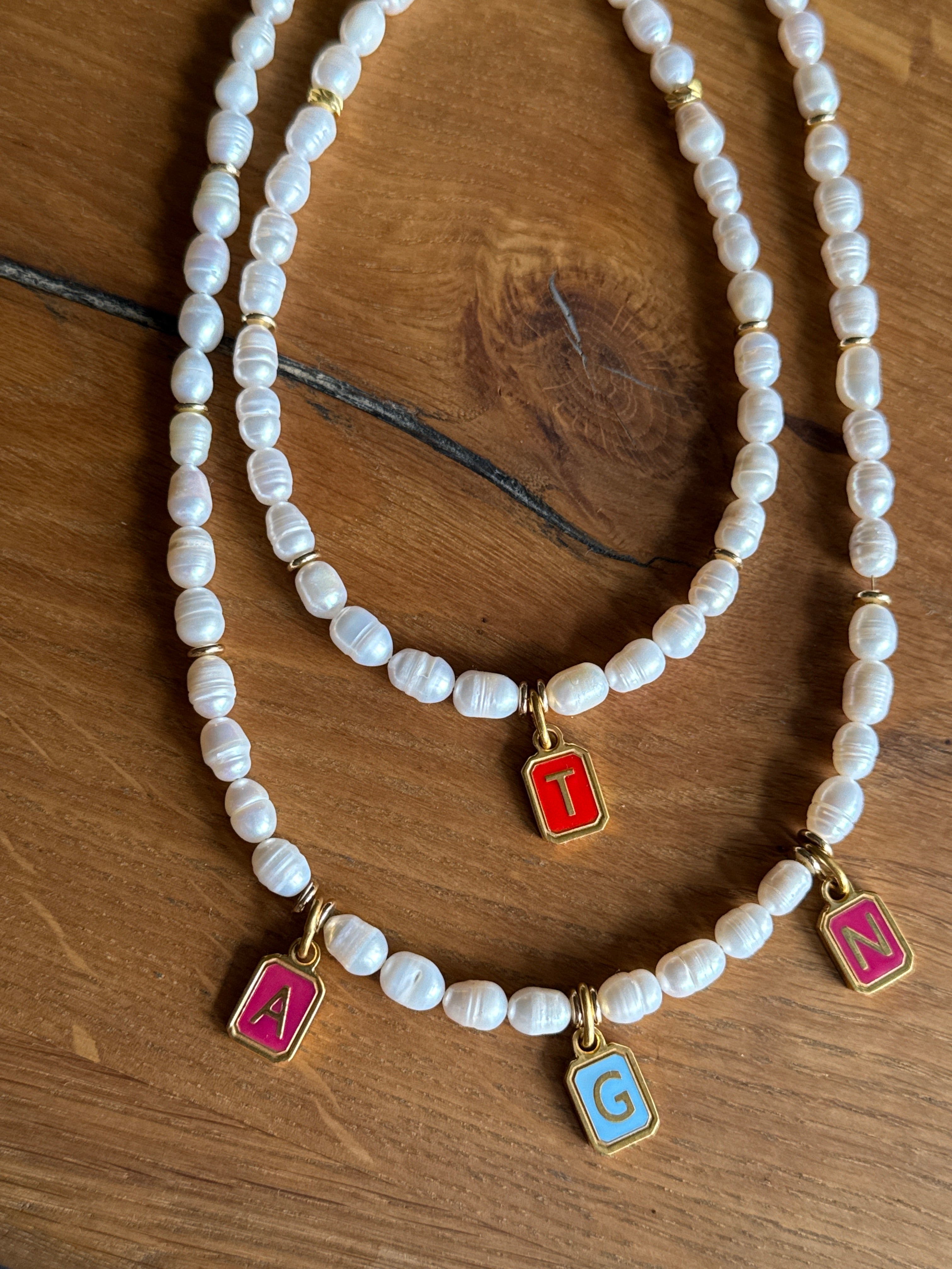 Pearl necklace with initial pendant